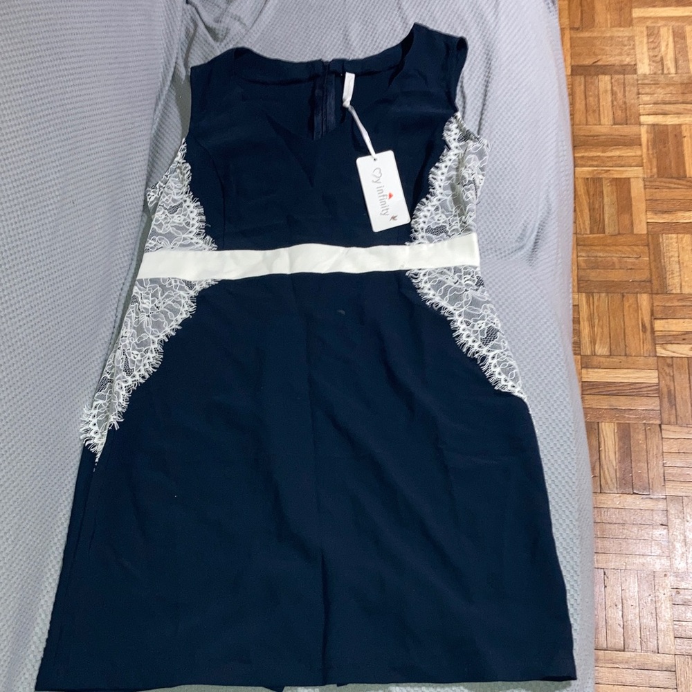 Chic Navy Dress with White Lace by Donna Ricco